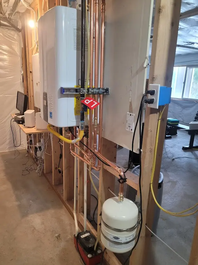 Licensed plumber repairing a kitchen sink in Iuka